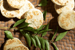 COCONUT ROTI by Peter Kuruvita<br><h6>A breakfast staple in Sri Lanka, this textural and tasty roti is slightly sweetened by the coconut and perfect with a spicy sambal or even a ripe banana.</h6>